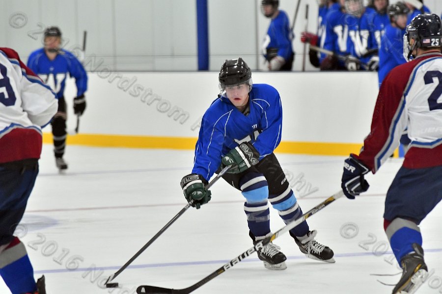 Wheaton College Men\'s Ice Hockey vs Middlesex Community College. - Photo By: KEITH NORDSTROM